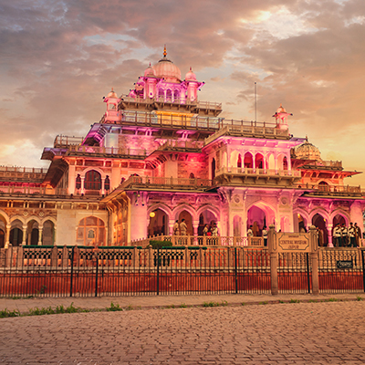 Albert Hall (Central Museum) in Jaipur with a vibrant and colorful illumination, presenting a mesmerizing view of architectural grandeur." title="Colorful View of Albert Hall Jaipur - Illuminated Splendo