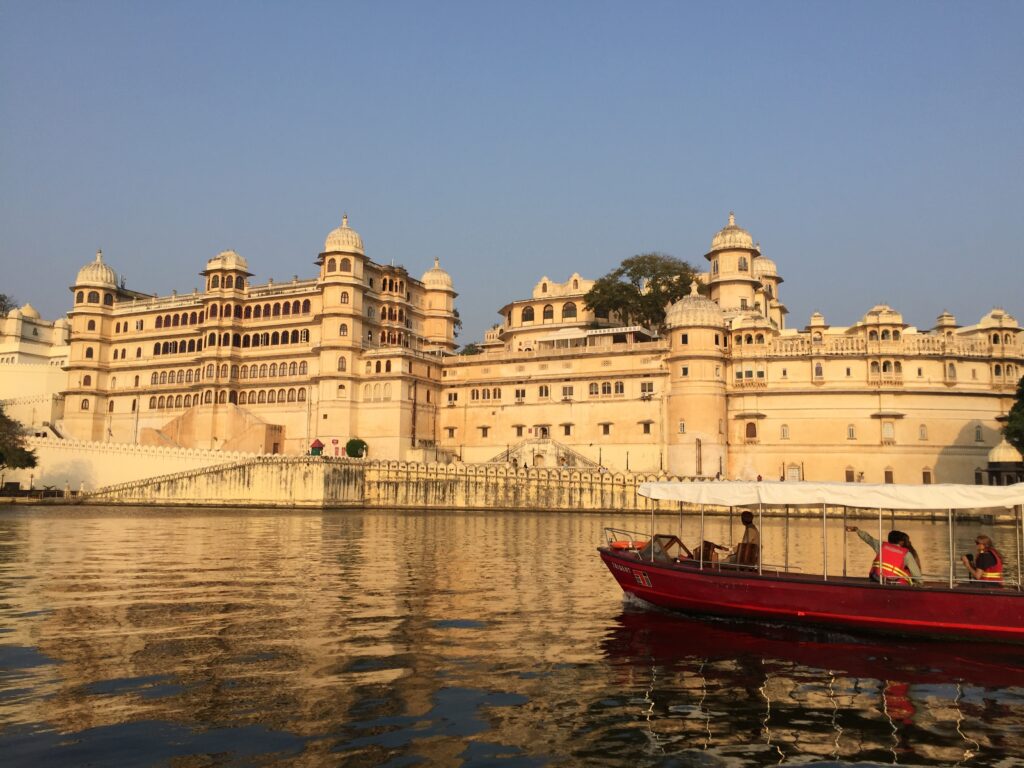 Panoramic view of City Palace, a historical marvel with intricate architecture, situated in Udaipur showcasing a blend of cultural heritage against a backdrop of stunning cityscape