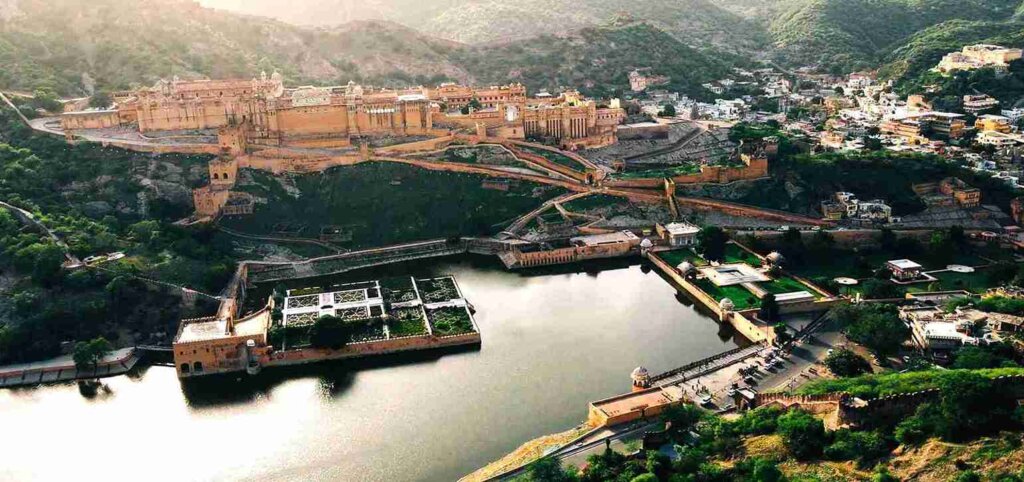 Amer Fort View: Capturing the majestic beauty of Amer Fort from a distance, showcasing its towering walls and surrounding landscape