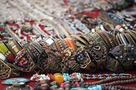 Collection of antique Rajasthan jewelry displayed together, featuring a variety of ornate pieces with intricate designs