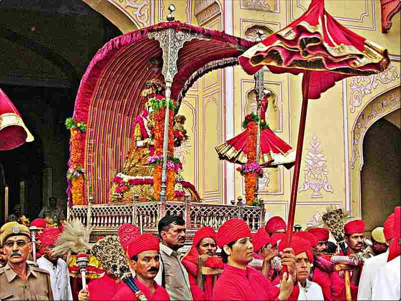 Teej Festival, Jaipur - Procession of Teej Mata with People Adorned in Red Dresses, Spectacular View with Goddess Idol