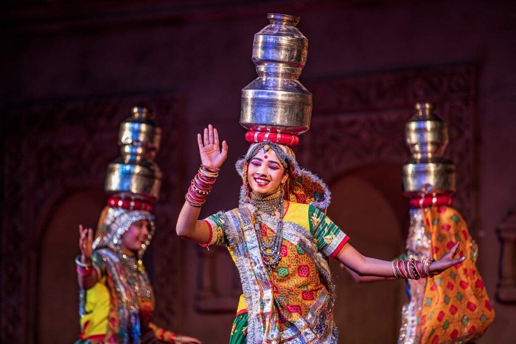 Rajasthani Folk Dance - Women performing Chari Dance with pots balanced on their heads in a stack