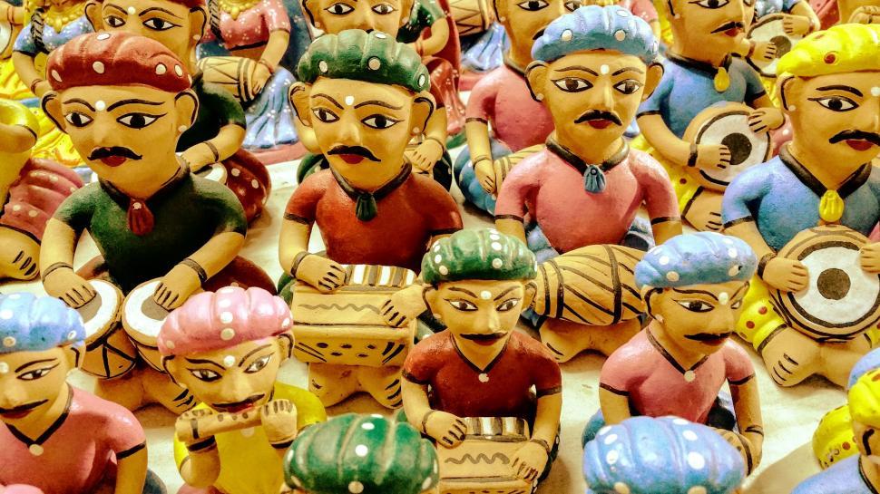 Colorful Rajasthani handicrafts including clay toys, showcasing vibrant hues and intricate designs