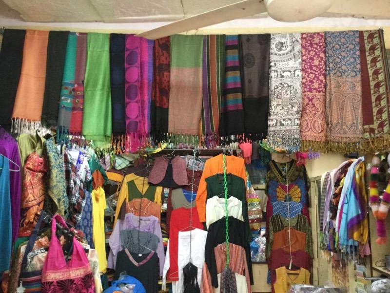 Sadar Bazaar in Jaisalmer, Rajasthan: Vibrant market street with colorful textiles and bustling activity