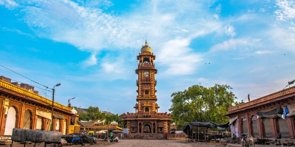 Clock Tower in Jodhpur, Rajasthan, India - a historic landmark amidst bustling streets. Image available on Wikimedia Commons