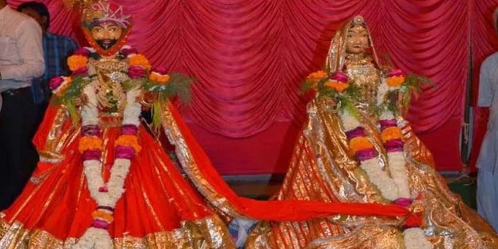  A clay idol of Gangaur, adorned with traditional attire and jewelry, symbolizing the vibrant Gangaur Festival celebrations in Rajasthan.