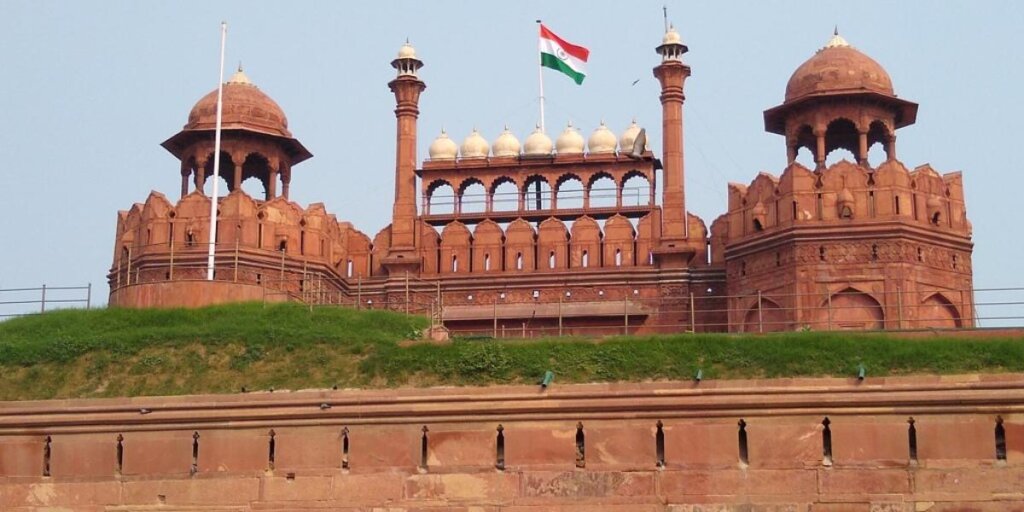 Aerial view of the Red Fort, a historic landmark in Delhi, India, showcasing its impressive red sandstone walls