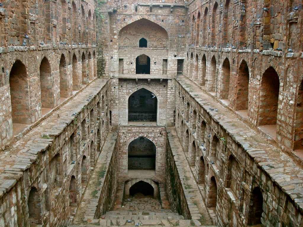 Agrasen ki Baoli, Delhi" - A historic stepwell nestled amidst bustling streets.