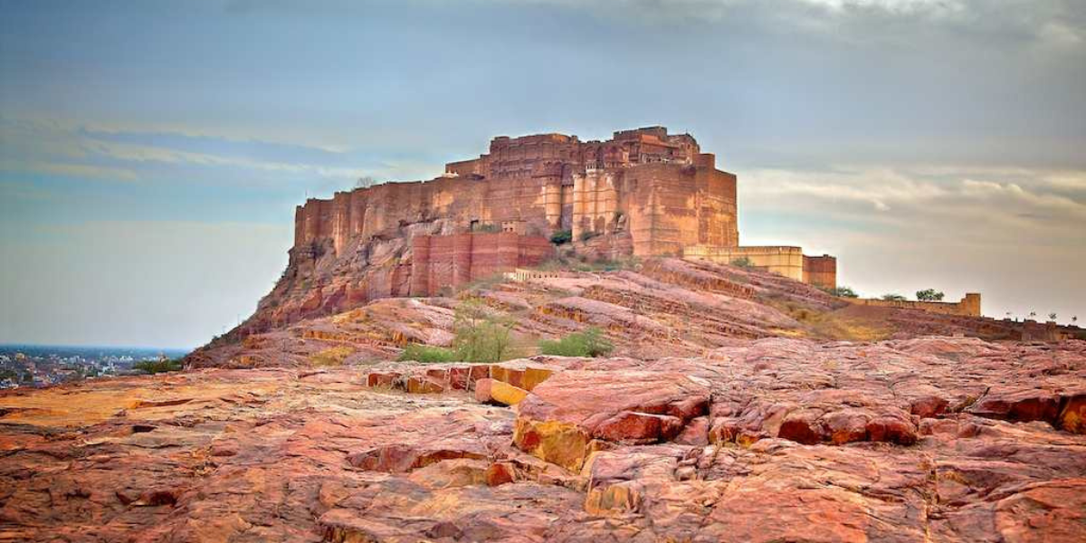 Lonely silhouette of Mehrangarh Fort atop a rocky hill in Jodhpur, Rajasthan, captured from Flickr.