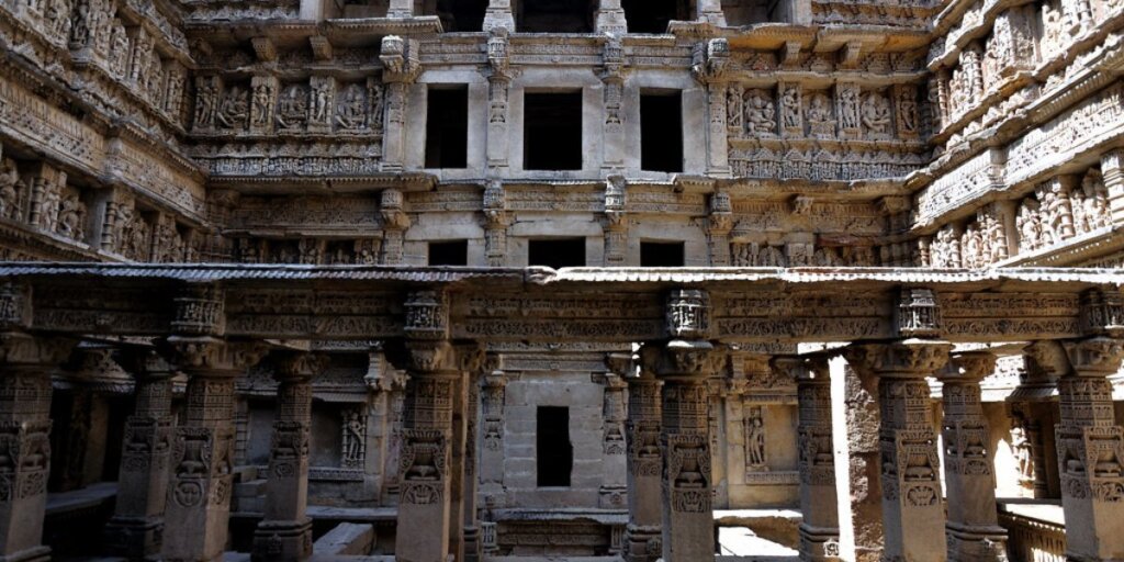 Rani-ki-vav in Patan, Gujarat: A UNESCO World Heritage Site featuring intricate stepwell architecture adorned with sculptures and carvings, representing ancient Indian craftsmanship and cultural significance.